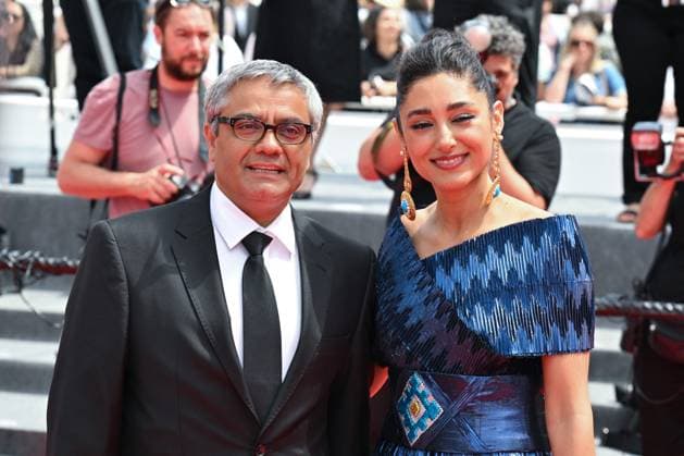Cannes The Seed Of The Sacred Fig Red Carpet NG Mohammad Rasoulof and Golshifteh Farahani attending the ?The Seed Of The Sacred Fig? Screening and Red Carpet at Palais Des Festivals in Cannes, France on May 24 2024 as part of the 77th Cannes Film Festival. Photo by Nicolas Genin ABACAPRESS.COM Cannes France  Copyright: xGeninxNicolas ABACAx