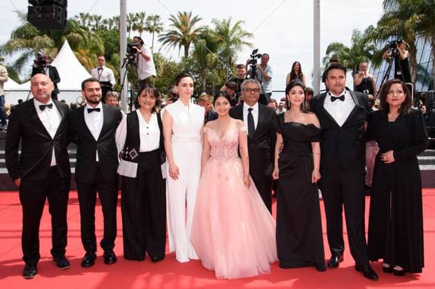 Cannes The Seed Of The Sacred Fig Red Carpet NG Mahsa Rostami, Soheila Golestani, Mohammad Rasoulof and the cast and crew attending the ?The Seed Of The Sacred Fig? Screening and Red Carpet at Palais Des Festivals in Cannes, France on May 24 2024 as part of the 77th Cannes Film Festival. Photo by Nicolas Genin ABACAPRESS.COM Cannes France  Copyright: xGeninxNicolas ABACAx