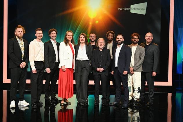 Award winners Lukas Wunschik, Markus Ott, Nicolai Mehring, Anne Jünemann, Yana Höhnerbach, Philipp Straetker, Rainer Klausmann, Noah Böhm, Daniel Guliyev, Christopher Aoun, and Walter Demonte Managing Director of the association DEUTSCHER KAMERAPREIS e V l r, pose on stage at the award ceremony 34 German Camera Award