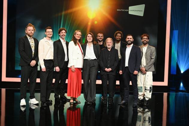Award winners Lukas Wunschik, Markus Ott, Nicolai Mehring, Anne Jünemann, Yana Höhnerbach, Philipp Straetker, Rainer Klausmann, Noah Böhm, Daniel Guliyev, Christopher Aoun, l r, posing on stage at the award ceremony 34 German Camera Award
