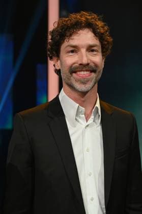 Cinematographer Nicolai Mehring, winner of Best Camera Documentary Screen for his camera work in Erfundene Wahrheit - Die Relotius Affäre at the 34 German Camera Award ceremony