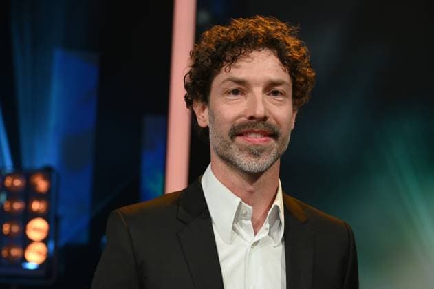 Cinematographer Nicolai Mehring, winner of Best Camera Documentary Screen for his camera work in Erfundene Wahrheit - Die Relotius Affäre at the 34 German Camera Award ceremony