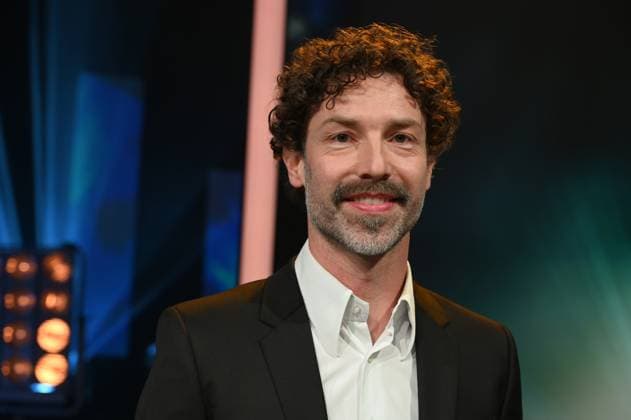 Cinematographer Nicolai Mehring, winner of Best Camera Documentary Screen for his camera work in Erfundene Wahrheit - Die Relotius Affäre at the 34 German Camera Award ceremony