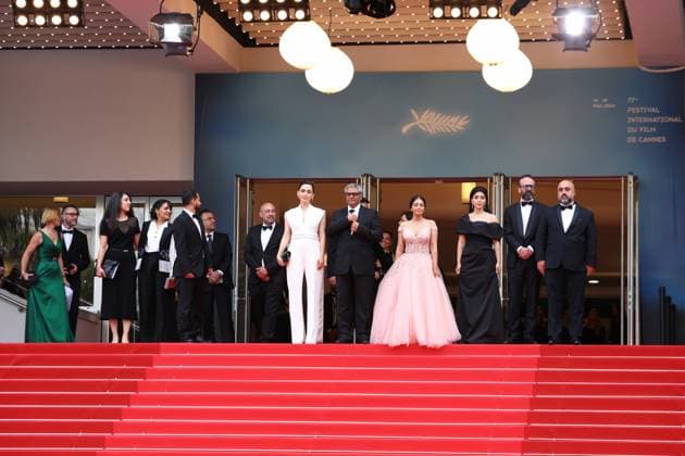 May 24, 2024, Cannes, Cote D azur, France: Mahsa Rostami, Soheila Golestani, MOHAMMAD RASOULOF and the cast and crew depart the red carpet after the Premier screening of The Seed of the Sacred Fig at the 77th Annual Cannes Film Festival at Palais des Festivals in Cannes, France Cannes France - ZUMAc179 20240524_zep_c179_115 Copyright: xMickaelxChavetx