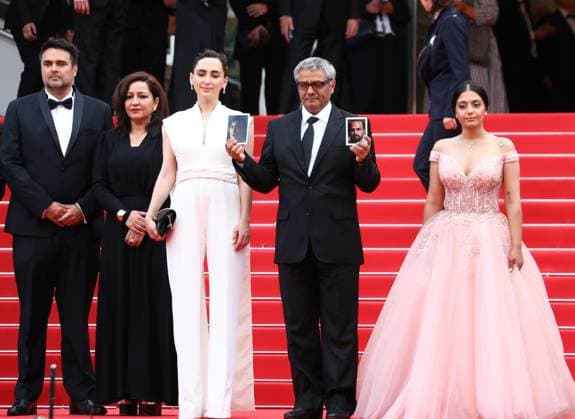 May 24, 2024, Cannes, Cote D azur, France: MOHAMMAD RASOULOF s Ã¢â‚¬ËœThe Seed of the Sacred FigÃ¢â‚¬â ¢ shakes up the Cannes Film Festival with a record 12-Minute standing ovation, becoming the Palme dÃ¢â‚¬â ¢Or frontrunner of the 77th Annual Cannes Film Festival at Palais des Festivals in Cannes, France Cannes France - ZUMAc179 20240524_zep_c179_116 Copyright: xMickaelxChavetx