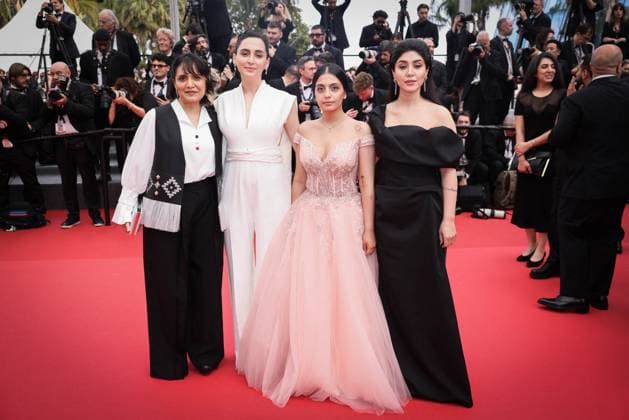 Cannes The Seed Of The Sacred Fig Exit Screening DB Soheila Golestani aand the rest of the cast depart the The Seed Of The Sacred Fig Red Carpet at the 77th annual Cannes Film Festival at Palais des Festivals on May 24, 2024 in Cannes, France. Photo by David Boyer ABACAPRESS.COM Cannes France  Copyright: xBoyerxDavid ABACAx