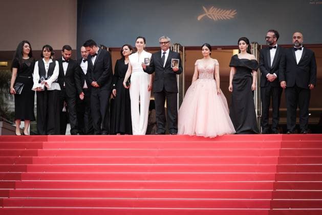 Cannes The Seed Of The Sacred Fig Exit Screening DB Mahsa Rostami, Soheila Golestani, Mohammad Rasoulof and the cast and crew depart the The Seed Of The Sacred Fig Red Carpet at the 77th annual Cannes Film Festival at Palais des Festivals on May 24, 2024 in Cannes, France. Photo by David Boyer ABACAPRESS.COM Cannes France  Copyright: xBoyerxDavid ABACAx