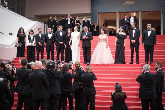 Cannes The Seed Of The Sacred Fig Exit Screening DB Mahsa Rostami, Soheila Golestani, Mohammad Rasoulof and the cast and crew depart the The Seed Of The Sacred Fig Red Carpet at the 77th annual Cannes Film Festival at Palais des Festivals on May 24, 2024 in Cannes, France. Photo by David Boyer ABACAPRESS.COM Cannes France  Copyright: xBoyerxDavid ABACAx