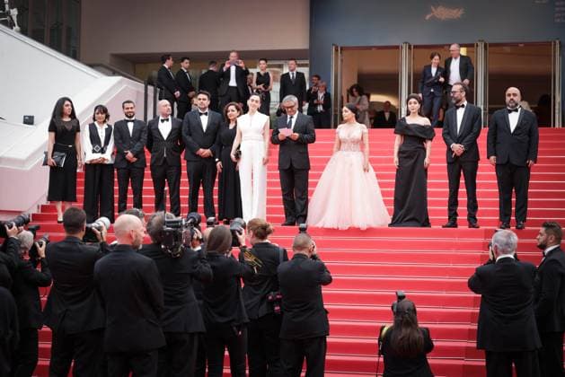 Cannes The Seed Of The Sacred Fig Exit Screening DB Mahsa Rostami, Soheila Golestani, Mohammad Rasoulof and the cast and crew depart the The Seed Of The Sacred Fig Red Carpet at the 77th annual Cannes Film Festival at Palais des Festivals on May 24, 2024 in Cannes, France. Photo by David Boyer ABACAPRESS.COM Cannes France  Copyright: xBoyerxDavid ABACAx