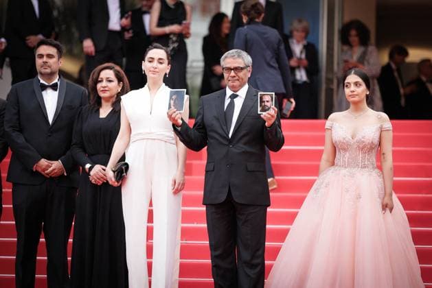 Cannes The Seed Of The Sacred Fig Exit Screening DB Mahsa Rostami, Soheila Golestani, Mohammad Rasoulof and the cast and crew depart the The Seed Of The Sacred Fig Red Carpet at the 77th annual Cannes Film Festival at Palais des Festivals on May 24, 2024 in Cannes, France. Photo by David Boyer ABACAPRESS.COM Cannes France  Copyright: xBoyerxDavid ABACAx