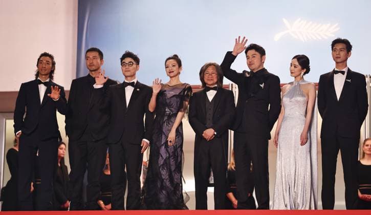 (240525) -- CANNES, May 25, 2024 -- Director Peter Ho-sun Chan (4th R) arrives with cast members for the screening of the film She s got no name at the 77th edition of the Cannes Film Festival in Cannes, southern France, on May 24, 2024. ) FRANCE-CANNES-FILM FESTIVAL-SHE S GOT NO NAME GaoxJing 