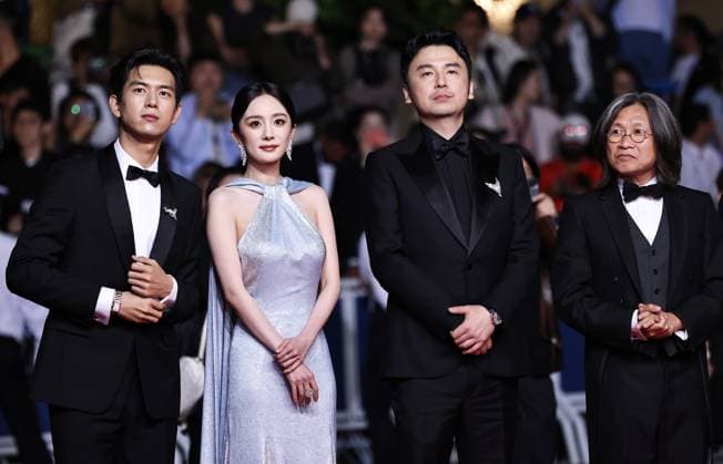 (240525) -- CANNES, May 25, 2024 -- Actor Li Xian, actress Yang Mi, actor Lei Jiayin, and director Peter Ho-Sun Chan (from L to R) arrive for the screening of the film She s got no name at the 77th edition of the Cannes Film Festival in Cannes, southern France, on May 24, 2024. ) FRANCE-CANNES-FILM FESTIVAL-SHE S GOT NO NAME GaoxJing 