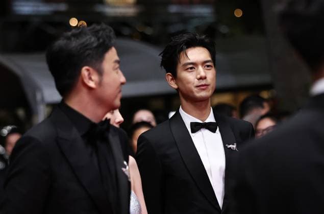(240525) -- CANNES, May 25, 2024 -- Actor Li Xian (2nd L) arrives for the screening of the film She s got no name at the 77th edition of the Cannes Film Festival in Cannes, southern France, on May 24, 2024. ) FRANCE-CANNES-FILM FESTIVAL-SHE S GOT NO NAME GaoxJing 