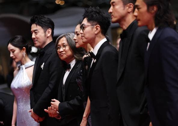 (240525) -- CANNES, May 25, 2024 -- Director Peter Ho-sun Chan (3rd L) arrives with cast members for the screening of the film She s got no name at the 77th edition of the Cannes Film Festival in Cannes, southern France, on May 24, 2024. ) FRANCE-CANNES-FILM FESTIVAL-SHE S GOT NO NAME GaoxJing 