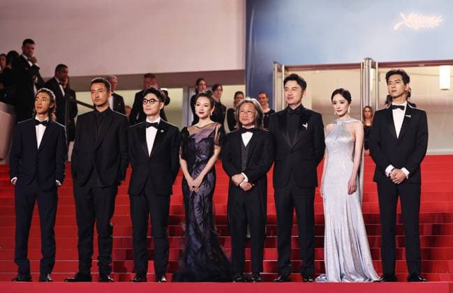 (240525) -- CANNES, May 25, 2024 -- Director Peter Ho-sun Chan (4th R) arrives with cast members for the screening of the film She s got no name at the 77th edition of the Cannes Film Festival in Cannes, southern France, on May 24, 2024. ) FRANCE-CANNES-FILM FESTIVAL-SHE S GOT NO NAME GaoxJing 