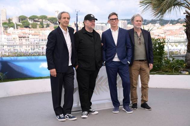 CANNES, FRANCE MAY 25 G D Alexandre DESPLAT, composer, Grà gory GADEBOIS, vocals, Michel HAZANAVICIUS, director, Serge HAZANAVICIUS, vocals, during the photocall of the film La plus prà cieuse des marchandises in compà tition at the 77th Cannes Film Festival at the Palais des Festivals on May 25, 2024 in Cannes, France CINEMA 77eme Festival de Cannes Photocall 25 05 2024 ValentinaClaret Panoramic