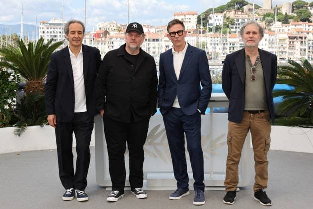 Cannes - The Most Precious Of Cargoes Photocall Alexandre Desplat, GrÃ gory Gadebois, Michel Hazanavicius and Serge Hazanavicius attend the La Plus Precieuse Des Marchandises (The Most Precious Of Cargoes) Photocall at the 77th annual Cannes Film Festival at Palais des Festivals on May 25, 2024 in Cannes, France. Photo by Shootpix ABACAPRESS.COM Cannes France  Copyright: xShootpix ABACAx