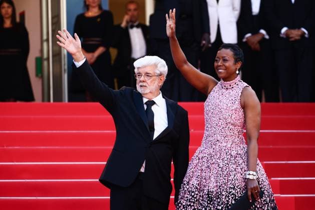 May 25, 2024, Cannes, France: George Lucas and Mellody Hobson attend the Red Carpet of the closing ceremony at the 77th annual Cannes Film Festival at Palais des Festivals on May 25, 2024 in Cannes, France. Cannes France - ZUMAz156 20240525_zip_z156_043 Copyright: xBeataxZawrzelx