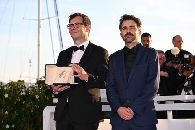 CANNES, FRANCE MAY 25 L R Nebojsa SLIJEPCEVIC, poses with the Short Film Palme d™Or Award for Â The man who could not remain silent Â and Daniel SOARES poses with the Short Film Special Mention Award for Â Bad for a moment Â at the winners photocall of the 77th annual Cannes Film Festival at Palais des Festivals on May 25th, 2024 in Cannes, France CINEMA 77eme Festival de Cannes Photocall des LaurÃ ats 25 05 2024 ValentinaClaret Panoramic 