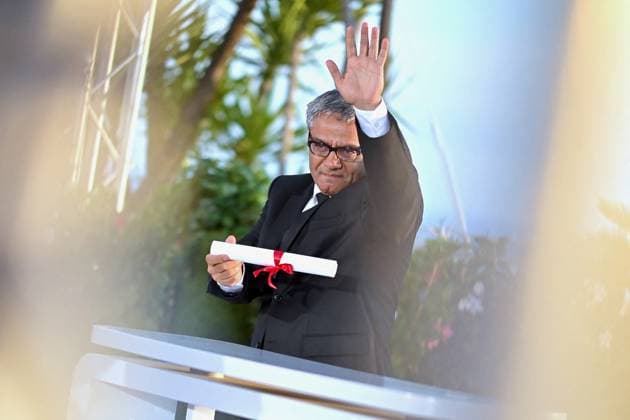 Cannes - Winners Photocall Mohammad Rasoulof poses with the Special Award for Best Screenplay for The Seed of the Sacred Fig during the Palme D Or Winners Photocall at the 77th annual Cannes Film Festival at Palais des Festivals on May 25, 2024 in Cannes, France. Photo by Franck Castel ABACAPRESS.COM Cannes France  Copyright: xCastelxFranck ABACAx