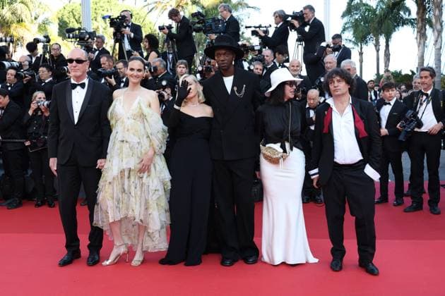 Cannes - Closing Ceremony Arrivals Members of the Camera d Or jury French deputy general manager HR and support TSF cinema Pascal Buron, Belgian director, screenwriter Zoe Wittock, French actress, director, producer and President of the Camera d Or jury Emmanuelle Beart, Congolese and Belgian director, songwriter, artistic director and President of the Camera d Or jury Baloji, French cinema section head ebra, treasurer sfcc Nathalie Chifflet and French director of photography Gilles Porte arrive for the Closing Ceremony of the 77th edition of the Cannes Film Festival in Cannes, southern France, on May 25, 2024. Photo by Shootpix ABACAPRESS.COM Cannes France  Copyright: xShootpix ABACAx