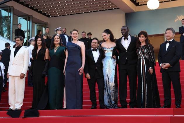 Cannes - Closing Ceremony Arrivals Jury Members Pierfrancesco Favino, Nadine Labaki, Lily Gladstone, President of the Jury Greta Gerwig, members Juan Antonio Bayona, Eva Green, Omar Sy, Ebru Ceylan, Hirokazu Kore-eda and Cannes Film Festival director Thierry FrÃ maux attend the Red Carpet of the closing ceremony at the 77th annual Cannes Film Festival at Palais des Festivals on May 25, 2024 in Cannes, France. Photo by Shootpix ABACAPRESS.COM Cannes France  Copyright: xShootpix ABACAx