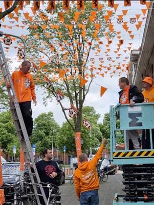 Family turns entire street ORANGE to celebrate start of Euros Story from Jam Press (Euros Celebration) Pictured: Video grab of the orange street ready to celebrate the Euros. Family turns entire street ORANGE to celebrate start of Euros An entire street has turned orange in celebration of the beginning of the UEFA Euros 2024. The road has been decorated with flags, while buildings and trees have been draped with tarpaulin. The thrifty family responsible says they have been stringing up decorations every two years since 1988, and around 15 of their friends come to help them. It has already taken them six weeks - and they won™t stop until the day of the first match. There are still some flags to hang - in total there will be 65 k  Copyright: xJamxPressxVid @marktweg_oranjestraat