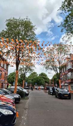 Family turns entire street ORANGE to celebrate start of Euros Story from Jam Press (Euros Celebration) Pictured: Video grab of the orange street ready to celebrate the Euros. Family turns entire street ORANGE to celebrate start of Euros An entire street has turned orange in celebration of the beginning of the UEFA Euros 2024. The road has been decorated with flags, while buildings and trees have been draped with tarpaulin. The thrifty family responsible says they have been stringing up decorations every two years since 1988, and around 15 of their friends come to help them. It has already taken them six weeks - and they won™t stop until the day of the first match. There are still some flags to hang - in total there will be 65 k  Copyright: xJamxPressxVid @marktweg_oranjestraat