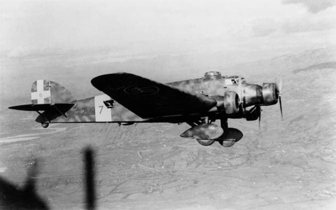 RECORD DATE NOT STATED Savoia Marchetti SM-81 A Savoia Marchetti Sm-81 Bomber Flying over Buildings During the Spanish Civil War Date: 1930s  Copyright: Copyrightx(c)Geminix2023.xCredit:xGemini 11950035