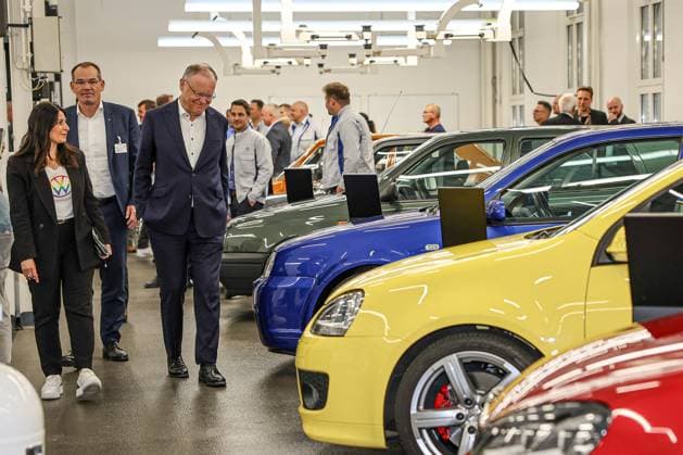 Ceremony 50 years of Golf production at Volkswagen in Wolfsburg Ceremony 50 years of Golf production, event room with various VW Golf cars, from l Daniela Cavallo, Chairwoman of the General and Group Works Council Volkswagen AG Dr Christian Vollmer, Member of the Board of Management for Production and Logistics at the Volk