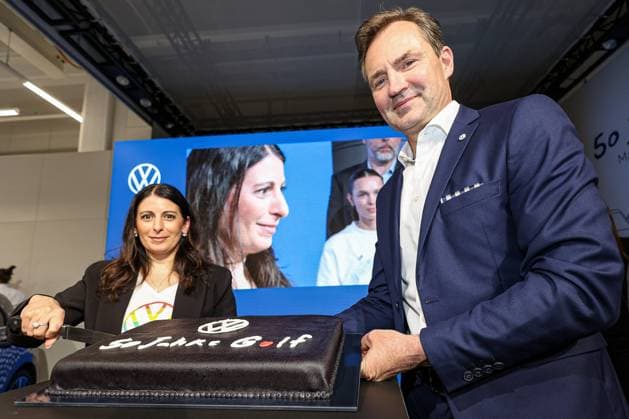 Ceremony 50 years of Golf production at Volkswagen in Wolfsburg Ceremony 50 years of Golf production, stage, cutting of the birthday cake, v r , Thomas Schäfer, CEO of the Volkswagen Passenger Cars brand, Member of the Board of Management of Volkswagen AG and Head of the Core brand group, Daniela Cavallo, Chairwoman of the General and Group Wo