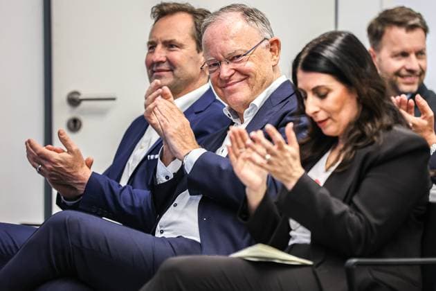 Ceremony 50 years of Golf production at Volkswagen in Wolfsburg Ceremony 50 years of Golf production, event room, from l to r , Thomas Schäfer, CEO of the Volkswagen Passenger Cars brand, Member of the Board of Management of Volkswagen AG and Head of the Core brand group, Stephan Weil, Minister President of Lower Saxony SPD , D