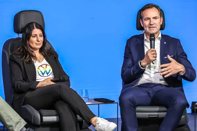 Ceremony 50 years of Golf production at Volkswagen in Wolfsburg Ceremony 50 years of Golf production, event room, stage, panel discussion, from left, Daniela Cavallo, Chairwoman of the General and Group Works Council Volkswagen AG, Thomas Schäfer, CEO of the Volkswagen Passenger Cars brand, Member of the Board of Management of Volkswagen AG and Head of