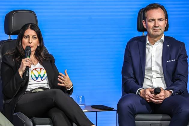 Ceremony 50 years of Golf production at Volkswagen in Wolfsburg Ceremony 50 years of Golf production, event room, stage, panel discussion, from left, Daniela Cavallo, Chairwoman of the General and Group Works Council Volkswagen AG, Thomas Schäfer, CEO of the Volkswagen Passenger Cars brand, Member of the Board of Management of Volkswagen AG and Head of