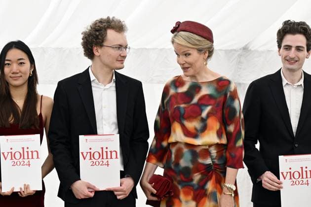 Third prize US Elli Choi, First prize Ukraine s Dmytro Udovychenko, Queen Mathilde of Belgium and Second prize US Joshua Brown pose at the award ceremony of the Queen Elisabeth Violin Competition 2024, at the Queen Elisabeth Music Chapel (Chapelle Musicale Reine Elisabeth - Muziekkapel Koningin Elisabeth), in Waterloo on Tuesday 04 June 2024.  ERICxLALMAND 93955700