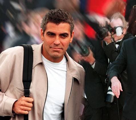 Photo Montage GEORGE CLOONEY Snubbed at Peacemaker Premiere George Clooney knew he was taking a risk speaking.out against the tabloids so close to the bow of his.new film, The Peacemaker, but he didn t seem at all.surprised or even bothered when the gathered.paparazzi refused to take his picture at the movie s.New York premiere Monday night. Keep walking! Keep walking! one photog yelled as Clooney stepped out of his limousine. The photographers booed the ER.star as he made his way down the red carpet of the.Ziegfeld Theater, putting down their cameras in.protest of the star s attacks on the tabloids..Shortly after Princess Diana s death, Clooney called.a press conference in which he likened tabloid.journalists to crack dealers. They said Copyright: xCapitalxPictures KIPAx