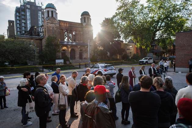 June 11, 2024, Toronto, On, CANADA: Parishioners and community members gather out front of the burnt out St. Anne s Anglican Church, during an evening vigil to mourn the loss of the church following a Sunday morning fire, Tuesday, June 11, 2024. Toronto CANADA  - ZUMAc35_ 20240611_zaf_c35_095 Copyright: xColexBurstonx