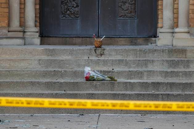 June 11, 2024, Toronto, On, CANADA: Flowers sit on the front steps of the burnt out St. Anne s Anglican Church, during an evening vigil to mourn the loss of the church following a Sunday morning fire, Tuesday, June 11, 2024. Toronto CANADA  - ZUMAc35_ 20240611_zaf_c35_101 Copyright: xColexBurstonx