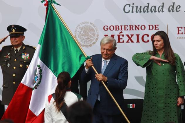 Ana Gabriela Guevara, Director of the National Commission of Physical Culture and Sports (CONADE), salutes while MexicoÃ¢â‚¬â ¢s Olympic team delivery the Mexican flag to MexicoÃ¢â‚¬â ¢s President Andres Manuel Lopez Obrador during the flag-bearing ceremony of the Mexican delegation that will participate in the Paris 2024 Olympic Games, at the National Palace. Mexico City Mexico - ZUMAe321 20240611_zia_e321_038 Copyright: xCarlosxSantiagox