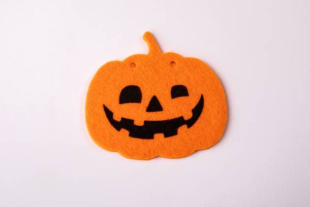 Halloween holiday decor. Orange pumpkin on a white background. Copyright: xEdgarsxSermulisx