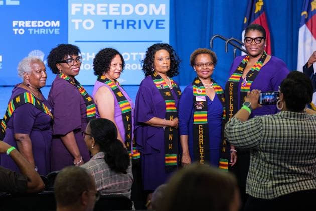 June 12, 2024, Charlotte, North Carolina, USA: Members of the Charlotte National Council of Negro Women take a photo in front of the stage before Vice President Kamala Harris delivers her remarks..Vice President Harris visits Charlotte, North Carolina on her economic opportunity tour leading up to the 2024 Presidential election. Charlotte USA - ZUMAv134 20240612_zsp_v134_009_20240612 Copyright: xMaxwellxVittoriox