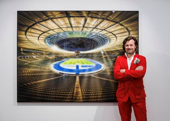 12 06 2024 Düsseldorf Munich-based artist and photographer Michael von Hassel at his VIP preview of the exhibition Cathedrals on the occasion of UEFA EURO 2024 at Galerie Anna Laudel Düsseldorf Galerie Anna Laudel North Rhine-Westphalia Germany