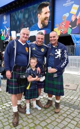 EURO 2024 Opening Fan Zone , 3 generations family from Aberdeen f l James Commins 64 with son Michael Harman 36 , son Jack 5 u Glenn Harman 60 in the Fanzone Düsseldorf Burgplatz Fanzone NRW Germany