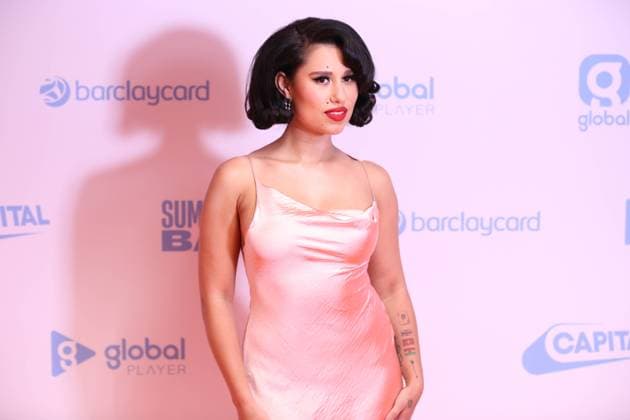 Raye attends the Capital Summertime Ball 2024 at Wembley Stadium on June 16, 2024 in London, England - BANG MEDIA INTERNATIONAL - Copyright: xDominicxHanson Famousx 6E993A5F-9250-4C8F-8DE2-AD0151B6D517.jpeg