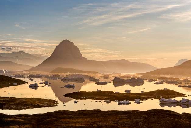 Creative Highlights World Midnight sun. Landscape, on the Drygalski Peninsula, with icebergs in the Uummannaq Fjord System in the northwest of Greenland, north of the polar circle. north america, Greenland, danish territory, summer Midnight sun. Landscape, on the Drygalski Peninsula, with icebergs in the Uummannaq Fjord System in the northwest of Greenland, north of the polar circle. north america, Greenland, danish territory, summer Copyright: Â¬ MartinZwick REDA&CO 1028_38_MZW18484