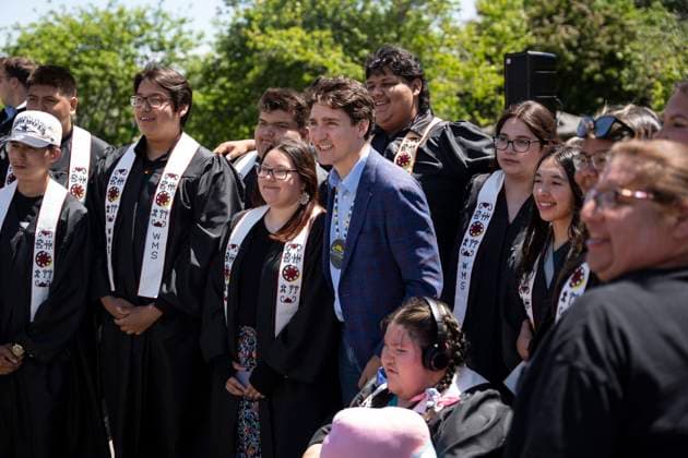 June 21, 2024, WeöÄÃ KoqmaöÄÃ Q First Nat, Ns, Canada: Prime Minister Justin Trudeau poses with the graduating class from the We koqma q Mikmaw School following an event for National Indigenous Peoples Day in We koqma q First Nation, N.S. on Friday, June 21, 2024. WeöÄÃ KoqmaöÄÃ Q First Nat Canada  - ZUMAc35_ 20240621_zaf_c35_031 Copyright: xDarrenxCalabresex