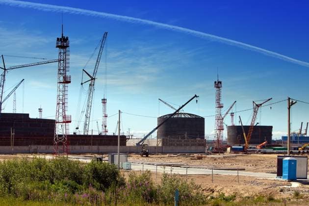 Work of new sea trading port of the Ust-Luga. Russia. ,model released, Symbolfoto; Arbeit des Neuen Meer handeltreibenden Hafen des der Ust Luga Russland ,model released, Symbolfoto ING_34903_00530 RECORD DATE NOT STATED