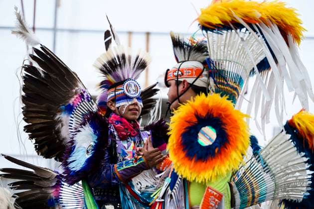 June 23, 2024, Ottawa, On, CAN: Youth grass dancers shake hands after competing in the Summer Solstice Indigenous Festival s 2024 Competition Pow Wow at Madahoki Farm in Ottawa, Sunday, June 23, 2024. Ottawa CAN  - ZUMAc35_ 20240623_zaf_c35_012 Copyright: xJustinxTangx