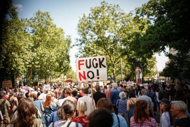 Bilder des Jahres 2024, News 06 Juni News Themen der Woche KW25 News Bilder des Tages Protest in Paris, France - 23 Jun 2024 (EDITOR S NOTE :Image depicts profanity) A protester holds a placard expressing opinion amid a large crowd of protesters during the demonstration. One week before the first round of the legislative elections, which will take place on Sunday June 30, 200 feminist groups and associations called for a demonstration against the far right and the National Rally party. Paris France Copyright: xSaraxCretax xSOPAxImagesx _LMO0147