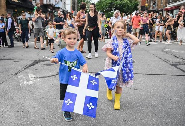 June 23, 2024, Montreal, Pq, Canada: Children hold Quebec flags as they attend a FÃªte Nationale event in Montreal, Sunday, June 23, 2024. Montreal Canada  - ZUMAc35_ 20240623_zaf_c35_027 Copyright: xGrahamxHughesx
